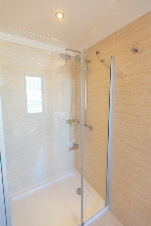 Sultan Palace Hotel Atyrau Exterior photo A shower door